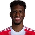 K. Coman